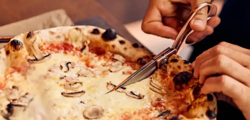 CUT PIZZA WITH SCISSORS